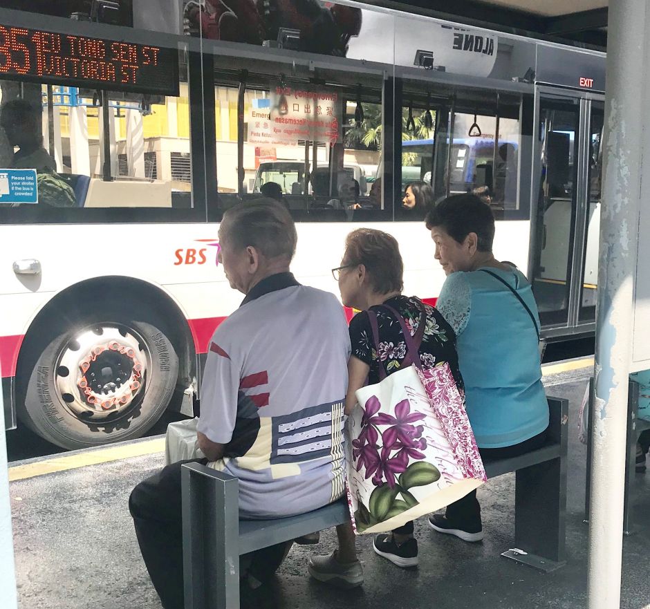 people wait for a bus